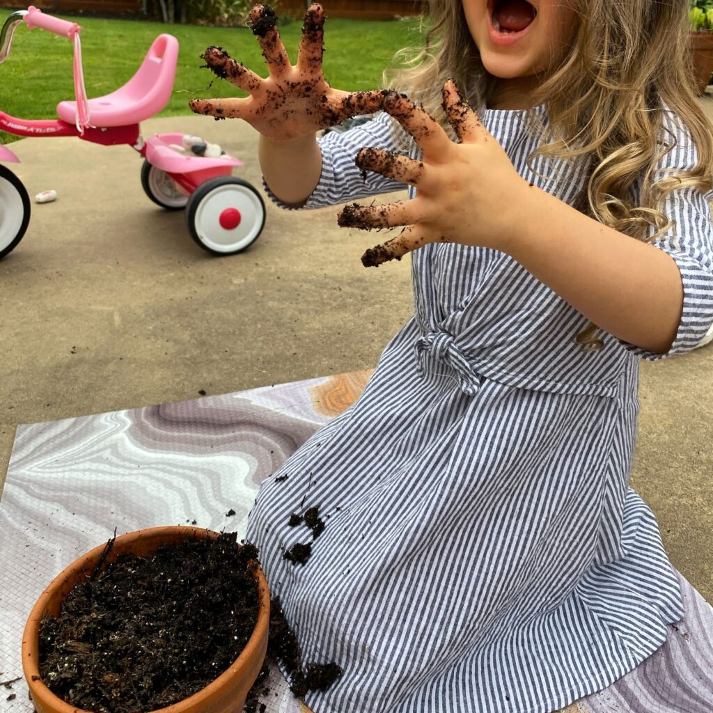 Toddlers Playing in Dirt